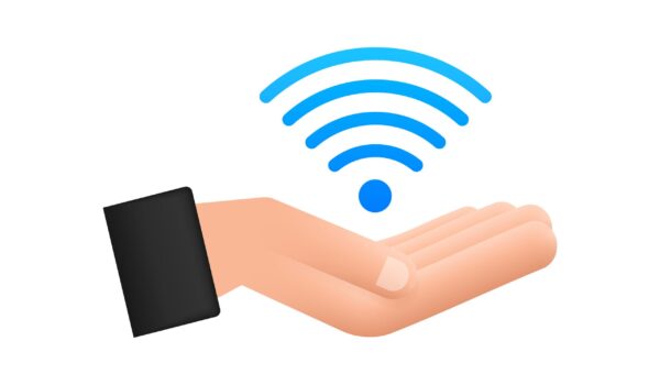 free wifi zone blue sign in hands icon. free wifi here sign concept. vector illustration.