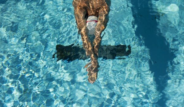 high angle male swimmer water pool