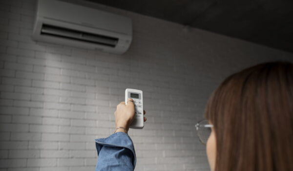 young woman using home technology